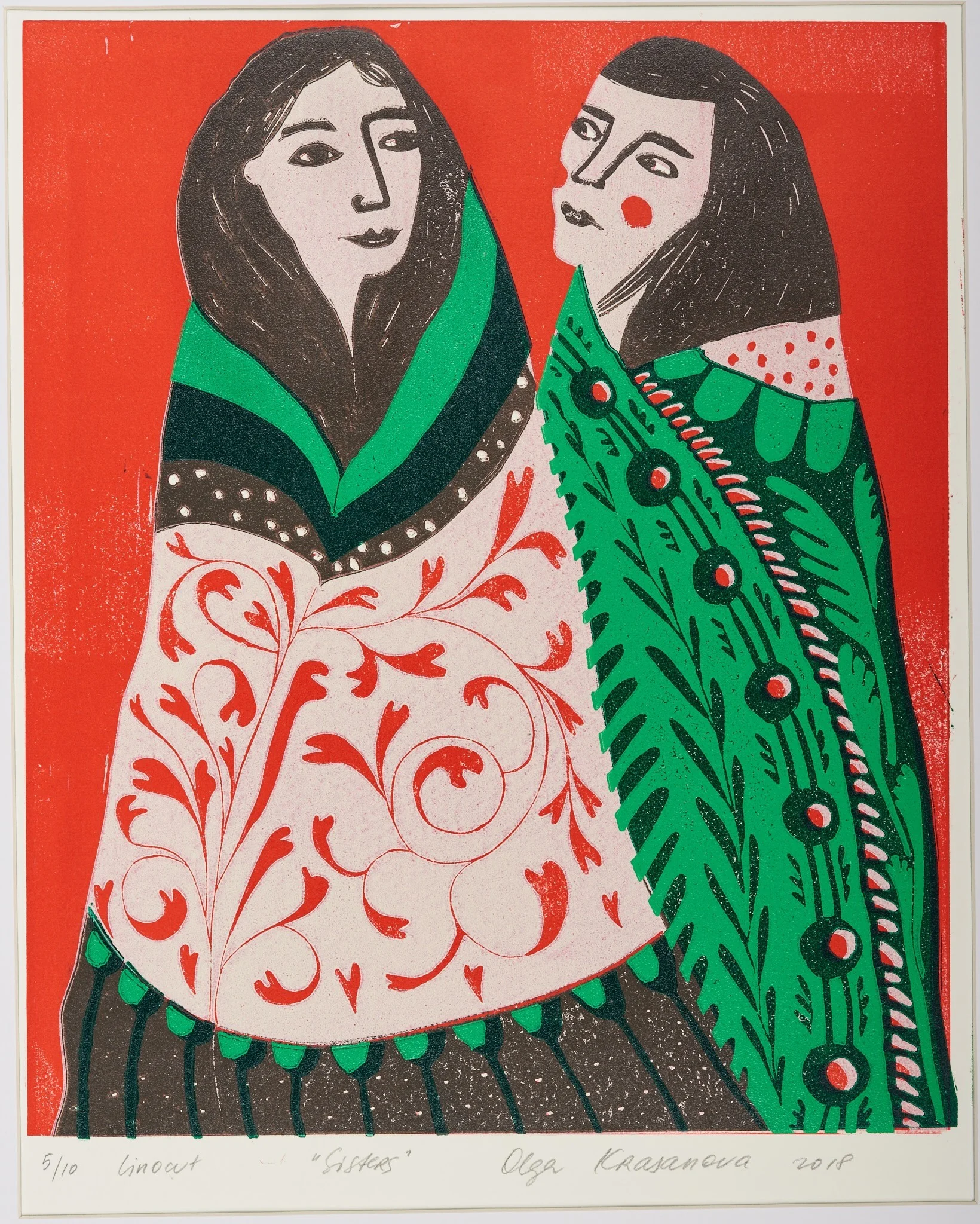 Sisters, linocut by Olga Krasanova — two women in green and red patterned dresses standing together